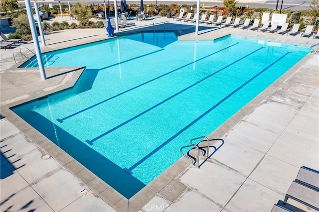 view of pool featuring a patio area