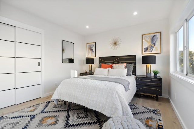 bedroom featuring light hardwood / wood-style floors