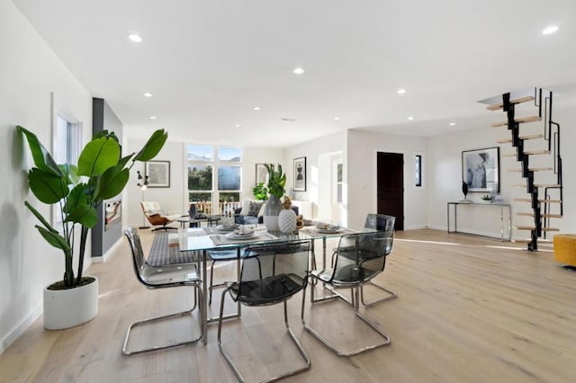 dining area featuring light wood-type flooring