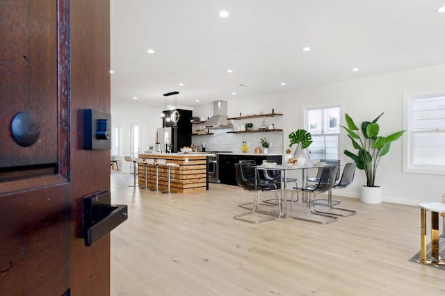 dining room with light hardwood / wood-style floors