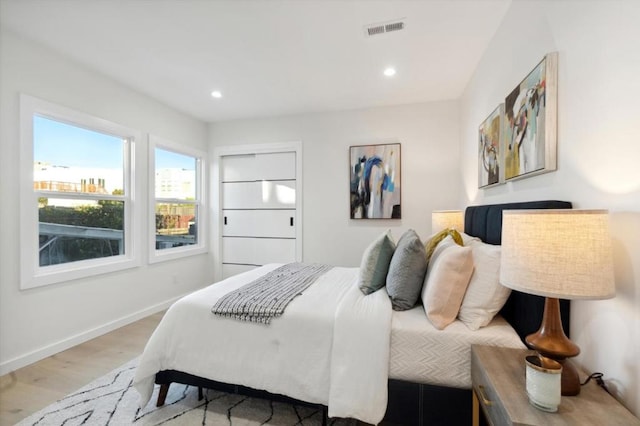 bedroom featuring light hardwood / wood-style flooring