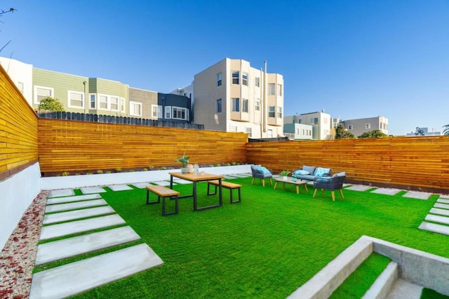 view of yard with outdoor lounge area