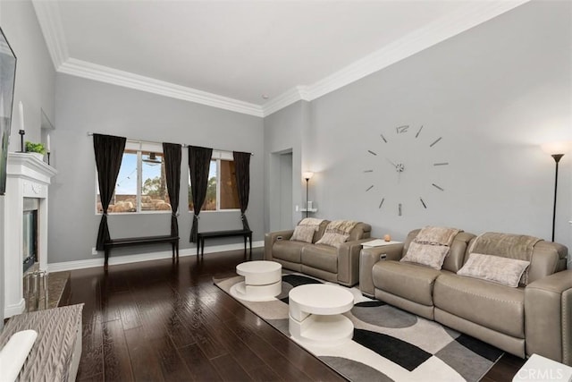 living room featuring dark hardwood / wood-style flooring and crown molding