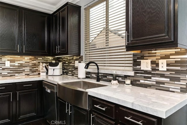 kitchen with crown molding, black dishwasher, sink, and decorative backsplash