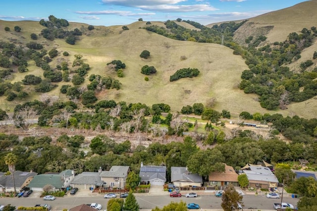 drone / aerial view featuring a mountain view