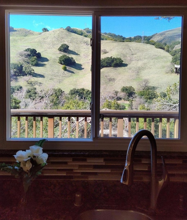 details featuring a mountain view and sink