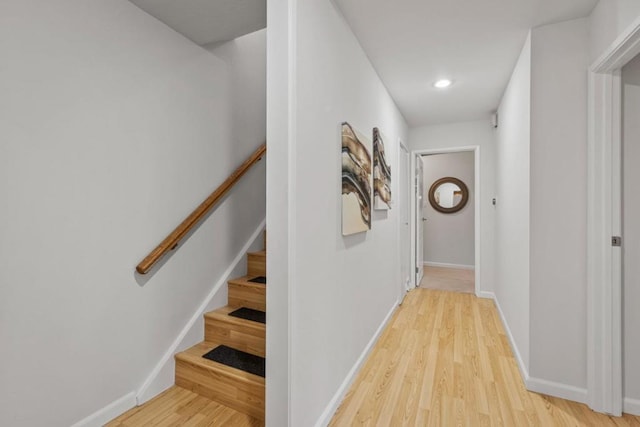 hallway with light wood-type flooring