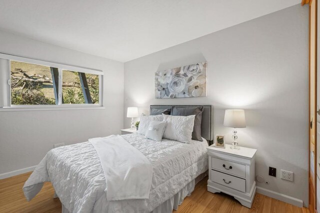 bedroom featuring light hardwood / wood-style floors