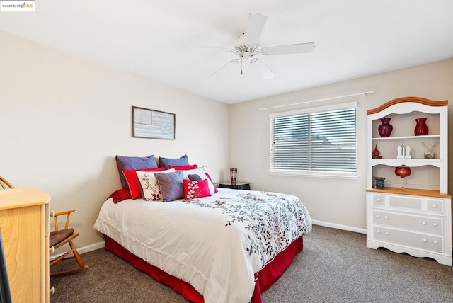 bedroom with ceiling fan and dark colored carpet