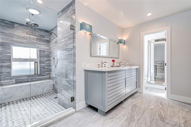 bathroom with a shower with door, vanity, and toilet