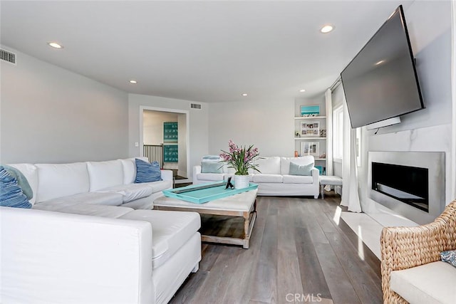 living room featuring dark hardwood / wood-style floors