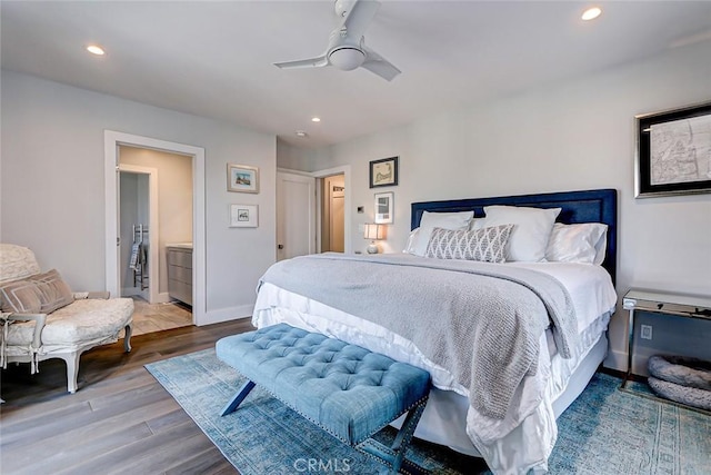 bedroom with wood-type flooring and ceiling fan