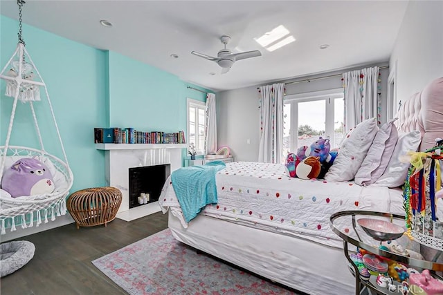 bedroom with dark wood-type flooring and ceiling fan