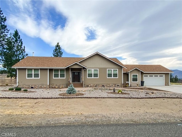 ranch-style home featuring a garage