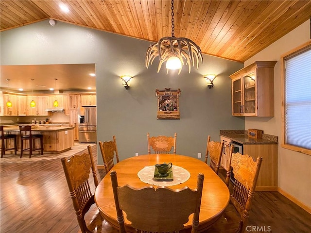 dining area featuring an inviting chandelier, wood ceiling, lofted ceiling, and wood-type flooring