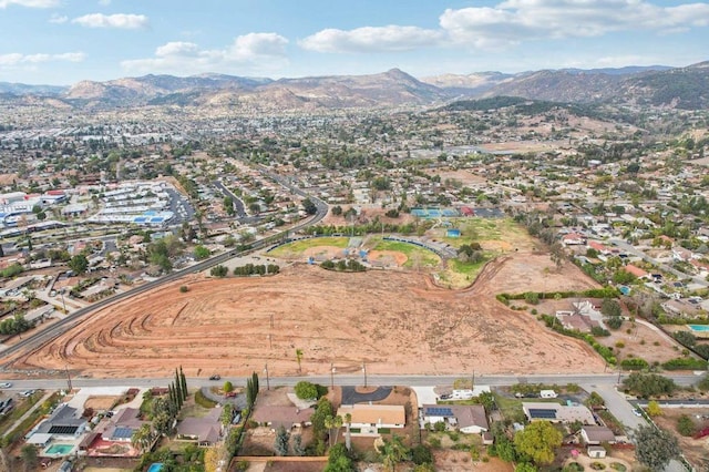 drone / aerial view featuring a mountain view