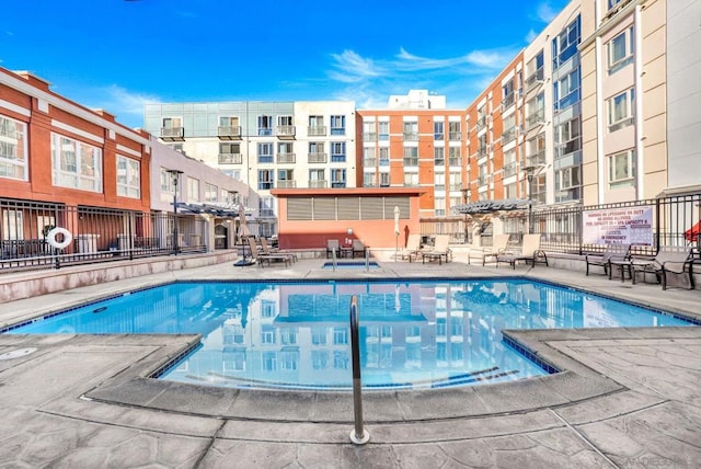 view of pool featuring a patio