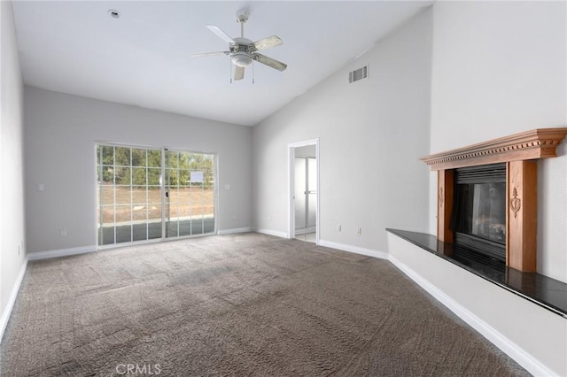 unfurnished living room with ceiling fan, carpet flooring, and high vaulted ceiling