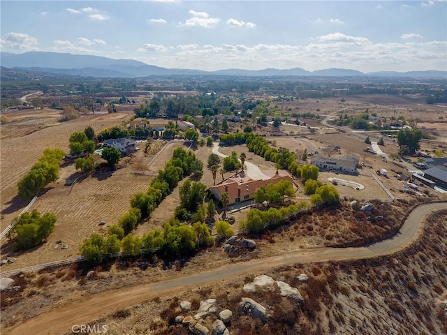 bird's eye view with a mountain view and a rural view