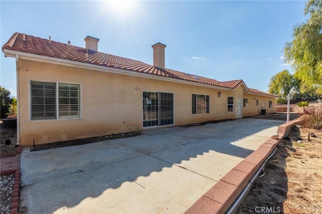 rear view of property with a patio