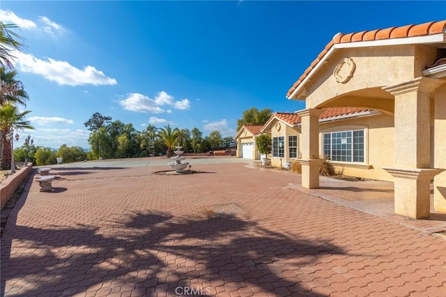 exterior space with a garage