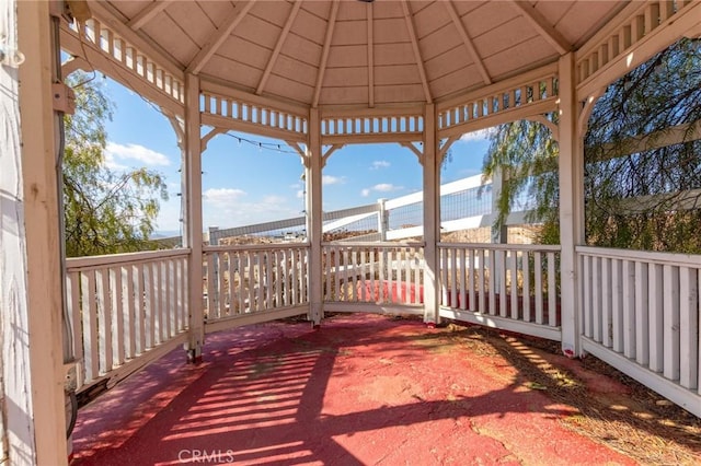 wooden terrace with a gazebo