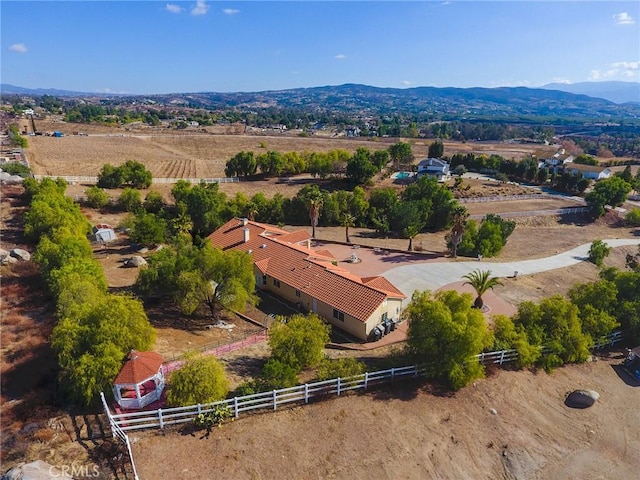 bird's eye view with a rural view and a mountain view