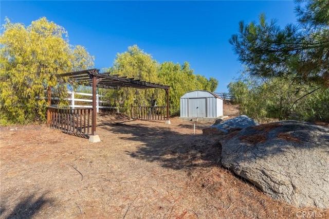 view of yard with a storage shed