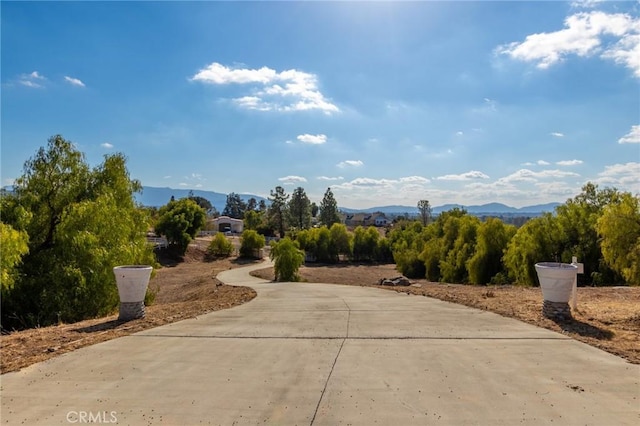 surrounding community featuring a mountain view