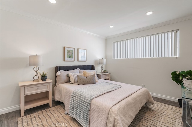 bedroom featuring wood-type flooring and ornamental molding