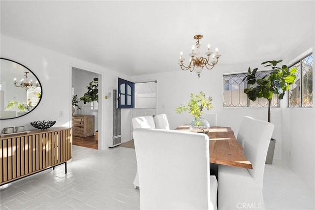 dining area with a chandelier