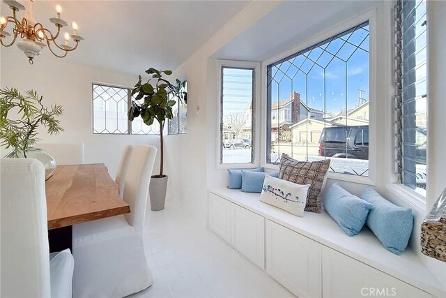 sitting room with a chandelier