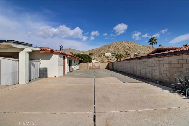 view of patio / terrace featuring a mountain view