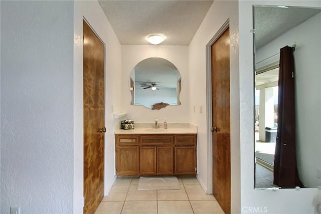 bathroom with vanity and tile patterned flooring