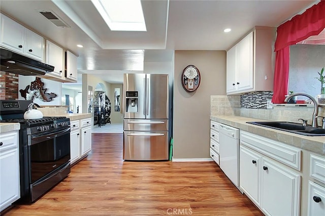 kitchen with white cabinetry, black range oven, dishwasher, and stainless steel fridge with ice dispenser