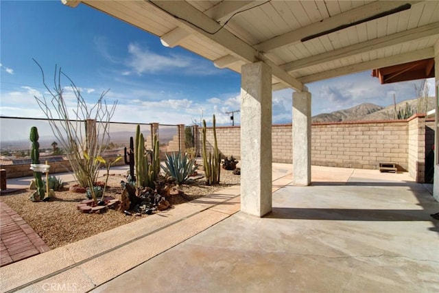 view of patio featuring a mountain view