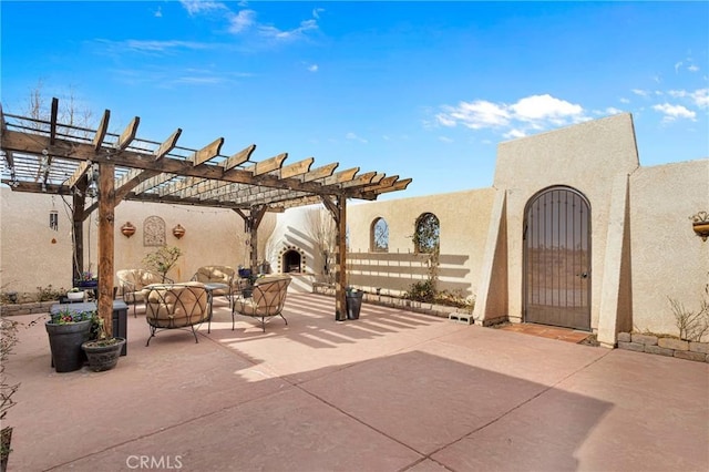 view of patio / terrace featuring a pergola