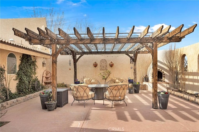 view of patio / terrace featuring a pergola