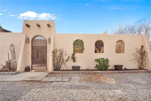 view of adobe home