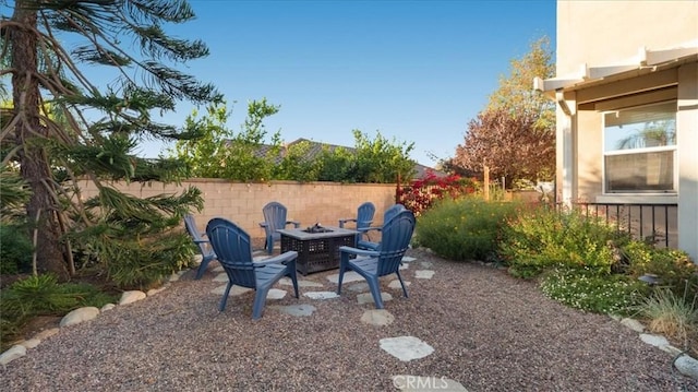 view of yard with a fire pit