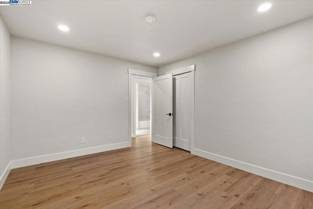 empty room featuring light hardwood / wood-style floors