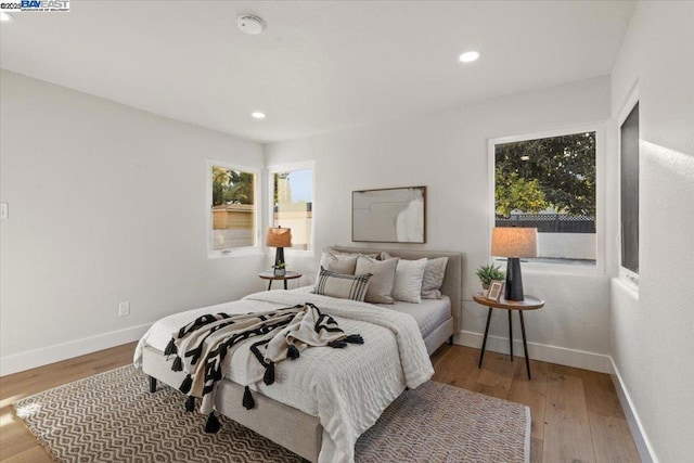 bedroom featuring hardwood / wood-style floors