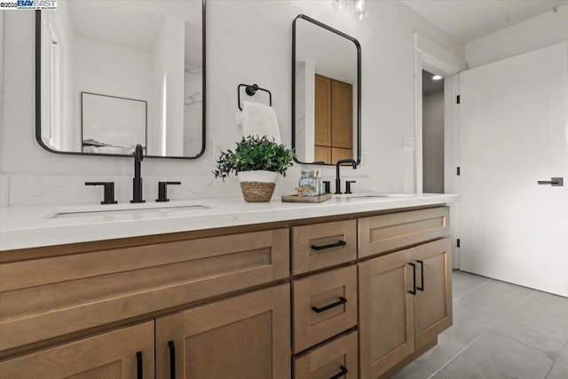 bathroom featuring vanity and tile patterned floors