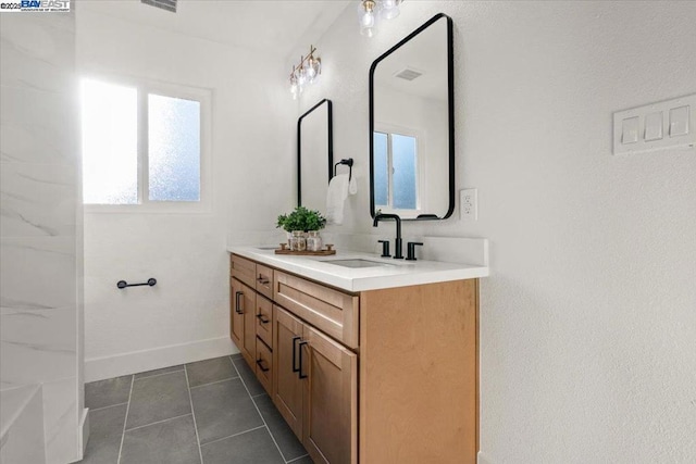 bathroom featuring vanity and tile patterned floors