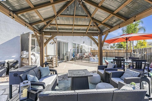 view of patio / terrace featuring a gazebo and outdoor lounge area