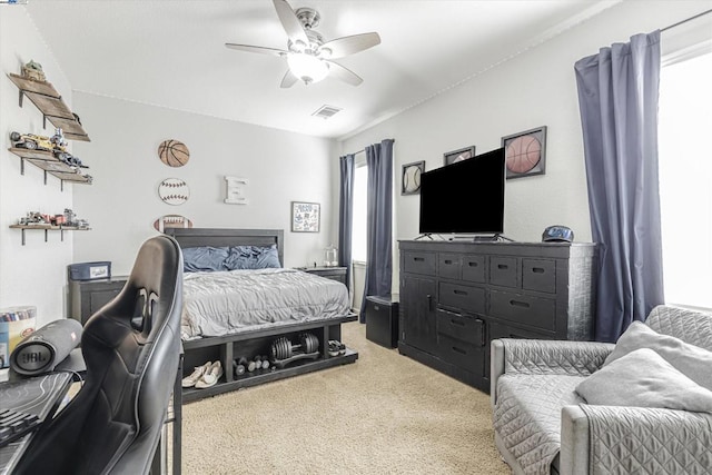 carpeted bedroom featuring ceiling fan