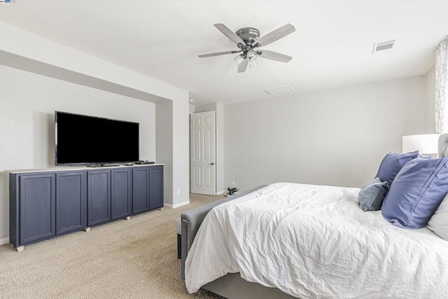 bedroom with light colored carpet and ceiling fan