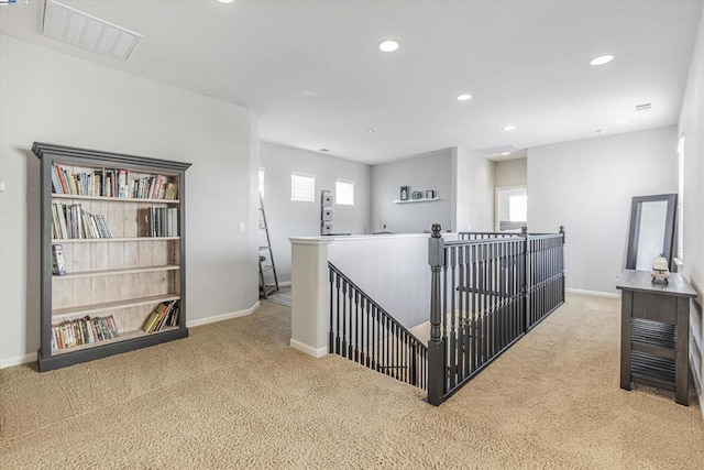 corridor featuring carpet