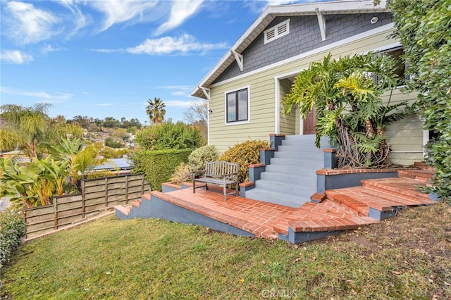 view of yard with a wooden deck