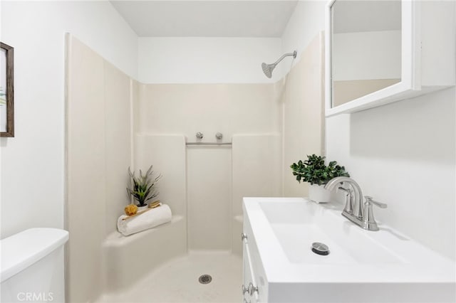 bathroom featuring toilet and sink